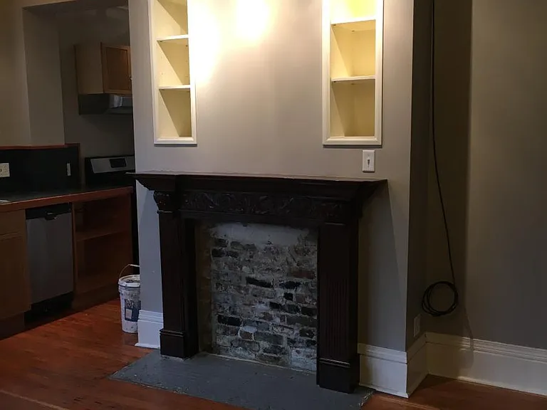 detail of decorative fireplace surround in living room