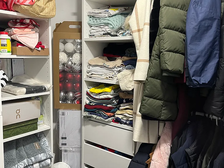 Walk-in closet (clothes illustrative only)