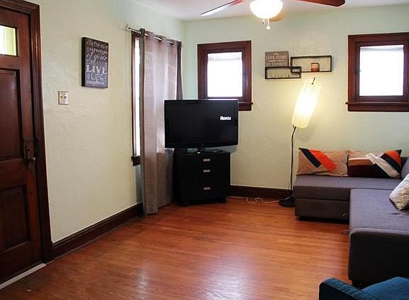 Bright living room with original woodwork