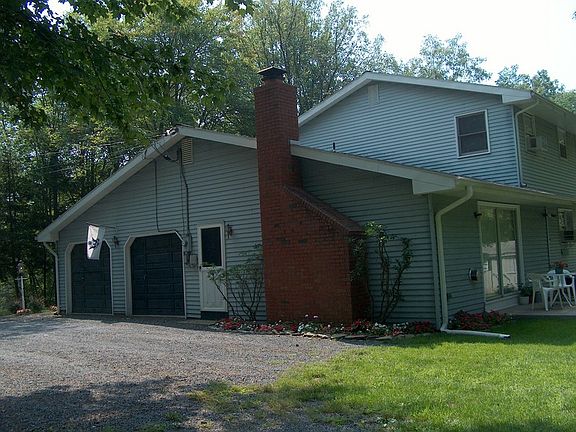 RT SIDE VIEW APPROACHING BACKYARD AREA