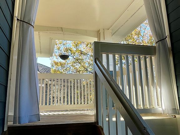Stairs up to unit & private porch