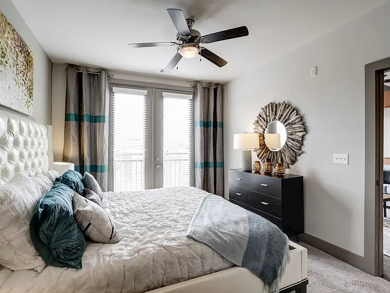 Spacious bedrooms with large windows for natural light