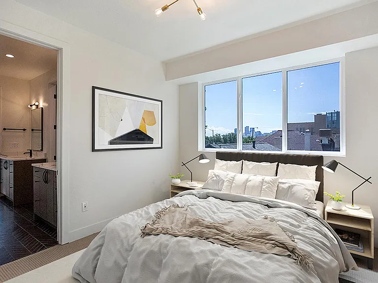 Bedroom 2. This image shows a virtually furnished space. Bedrooms come unfurnished.