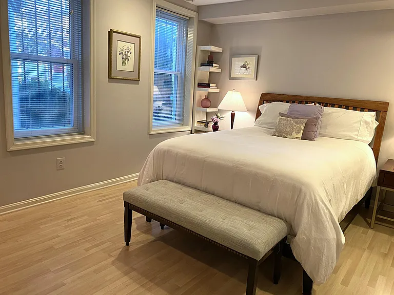 Queen bed in bedroom, large closet, large windows face quiet D St.