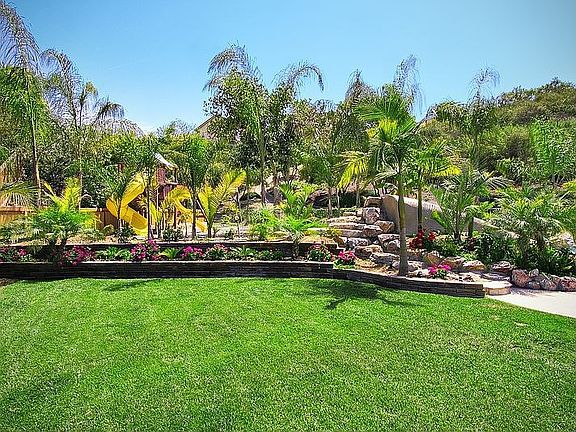 Spacious Grass Area & Play Structure Area