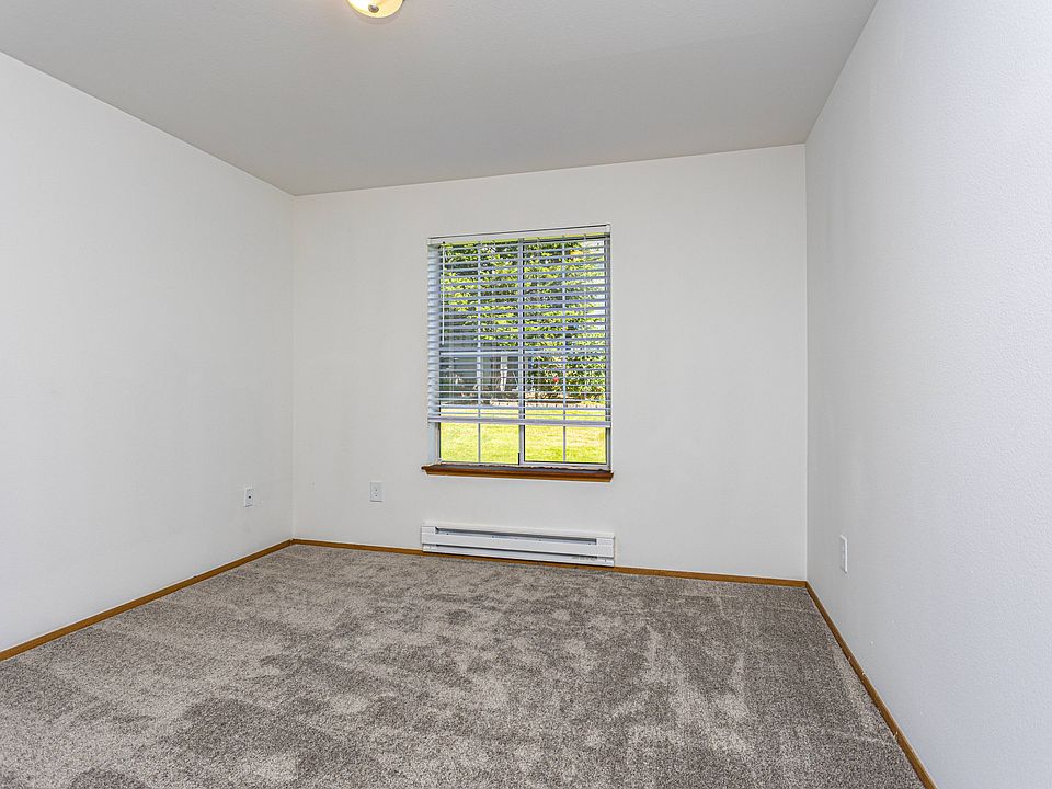 Bright and Cozy Bedroom at Winton Woods Apartments in Poulsbo, WA