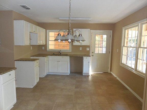 Kitchen and eat-in area. Dishwasher, stove and refrigerator (not pictured) ARE included.