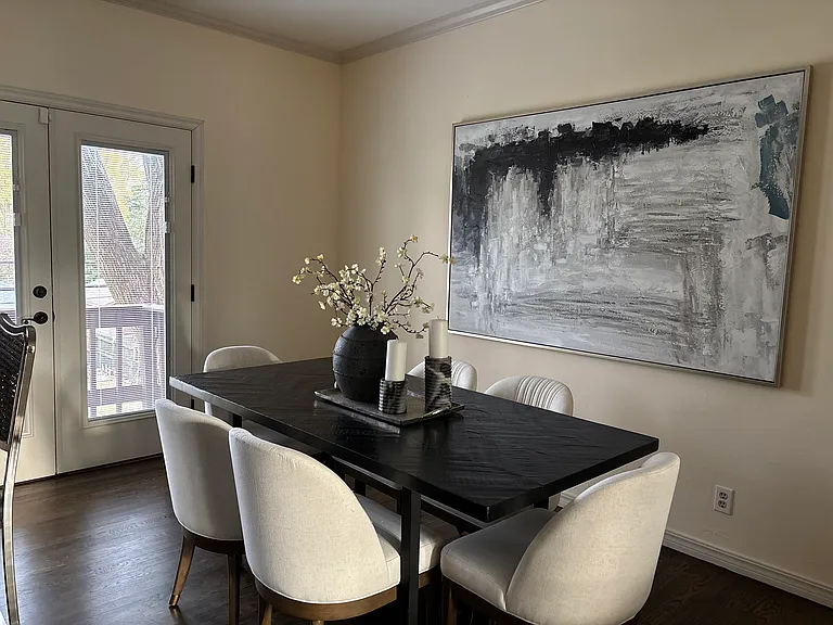 Dining room on entry level with French doors out to balcony