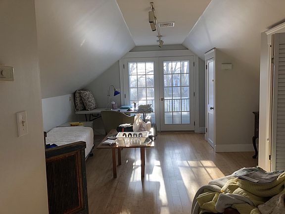 Living space can double as guest room w/ small bed