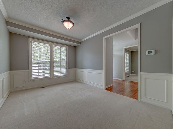 Opens to entry and kitchen