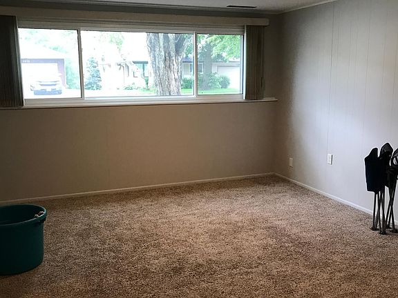 Large window in lower level family room
