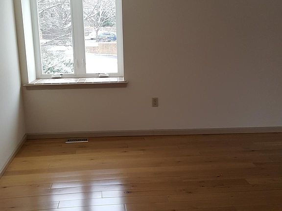 End unit-open Living/Dining area with more sunshine