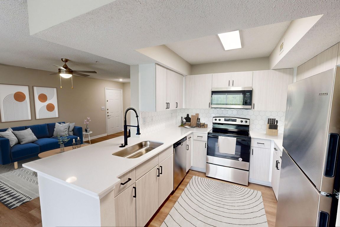 Newly Renovated Kitchen with Stainless Steel Appliances