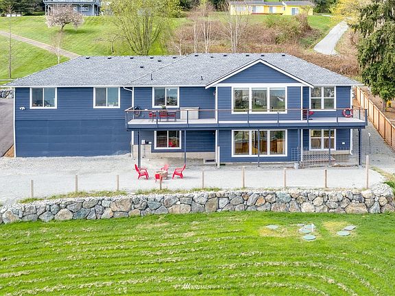 Plenty of outdoor space on this half acre overlooking Driftwood Shores with spectacular views of Port Susan Bay and Cascade Range !