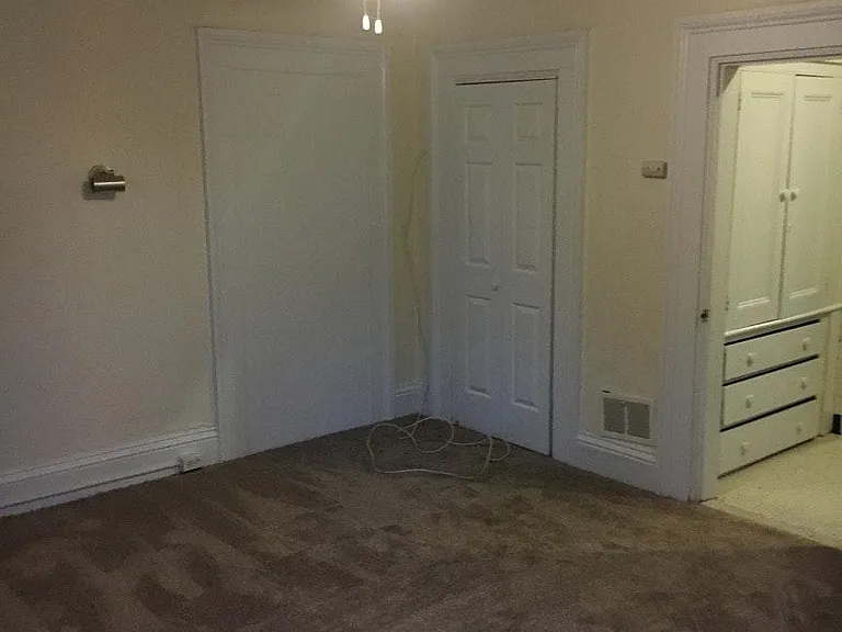 Bedroom with new carpeting