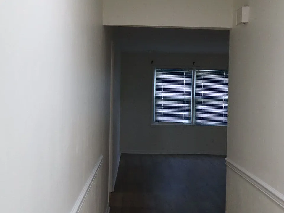 Hallway leading to living room