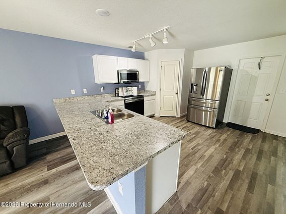 4th image of 12020 Pine Warbler Ave