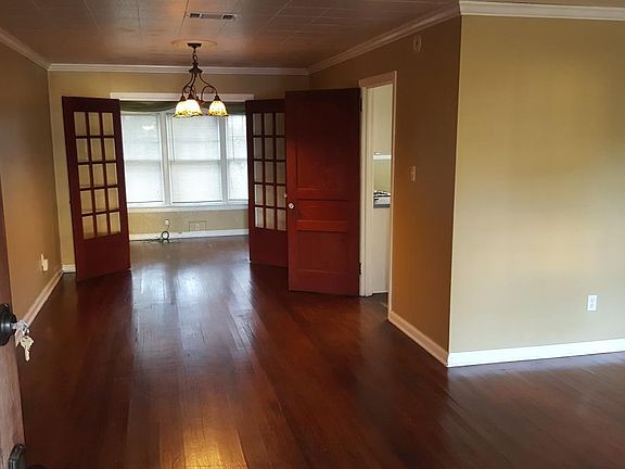 Dinning Area, Bonus Room in Background with Old French Doors