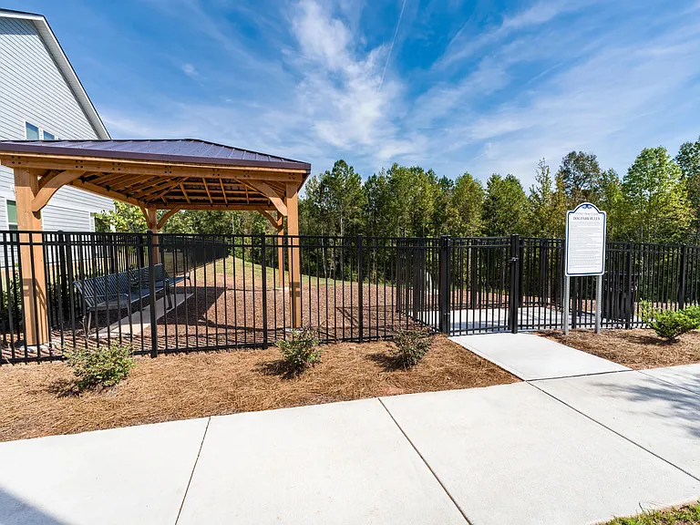 One of two dedicated dog parks at Amavi Brier Creek, offering a convenient place to play and socialize within this thoughtfully planned Durham community.