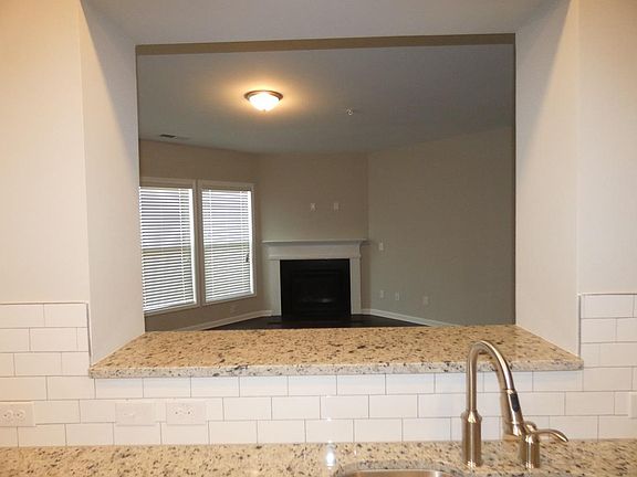 1238 Fisher Trace, Cumming, GA 30041 View from the kitchen over the breakfast bar towards the family room.
