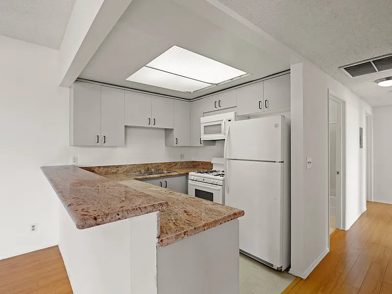Kitchen with Refrigerator, Stove, Dishwasher, and Microwave