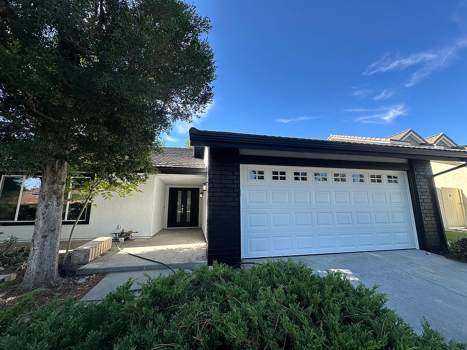 Newly painted exterior, new windows, new front door and lighting.
