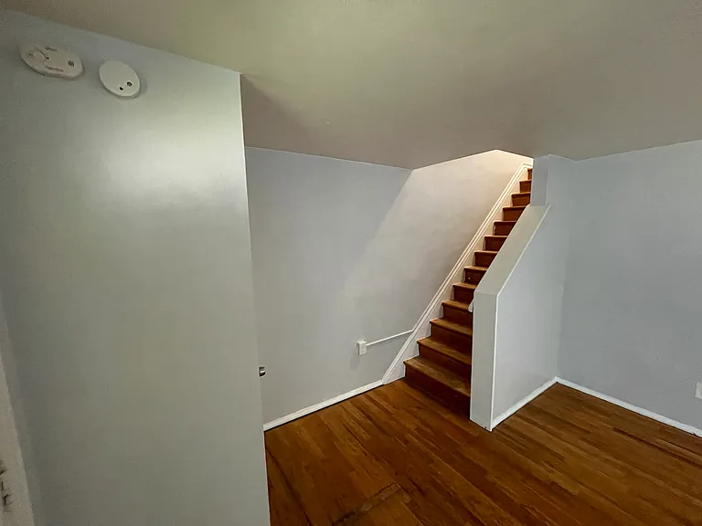 Stairs to upper level, view from main entrance