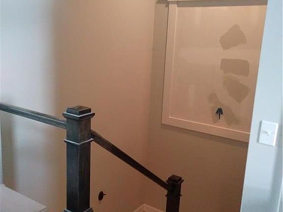Open stairway with custom mirror
