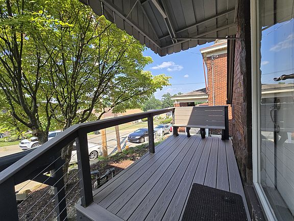 New front porch with bench.