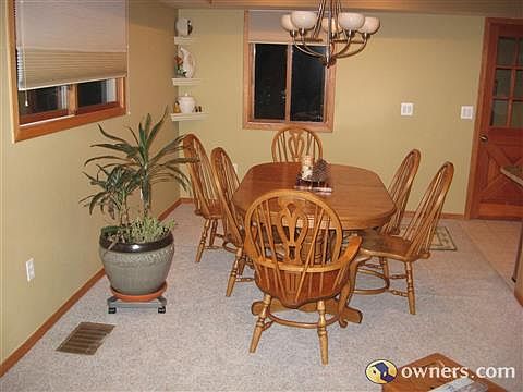 Dining Area with island between kitchen