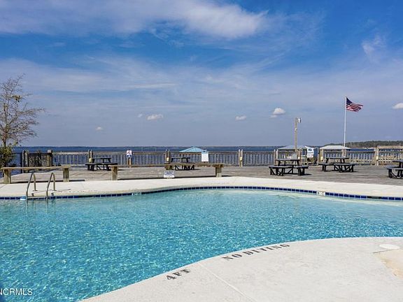 Neighborhood private pool overlooking the water