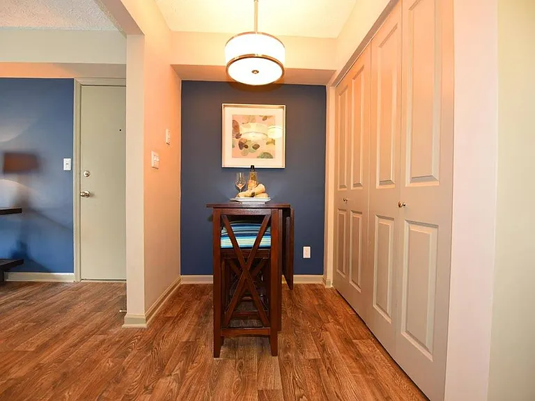 Dining nook with hardwood-style flooring