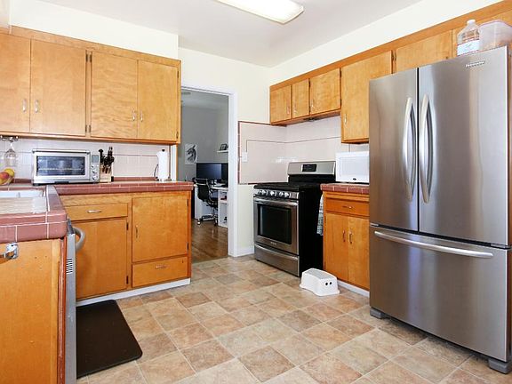 Kitchen and view of Dining Room (pocket door can be closed)