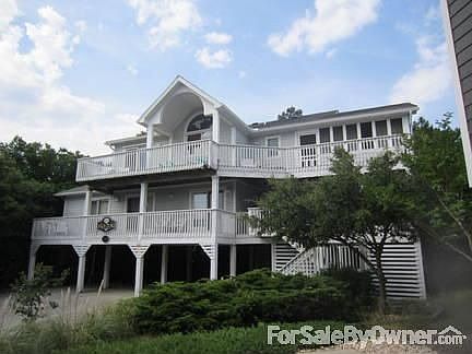 Large beachhouse, 2 blocks from ocean.
						:
						High on top a sand dune in Corolla Light Resort Community, Corolla, NC.