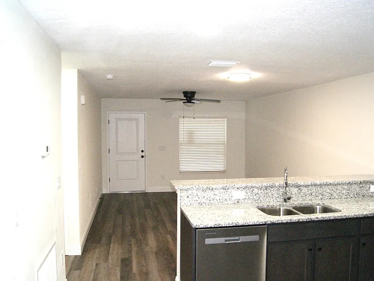 Kitchen toward living room and front door