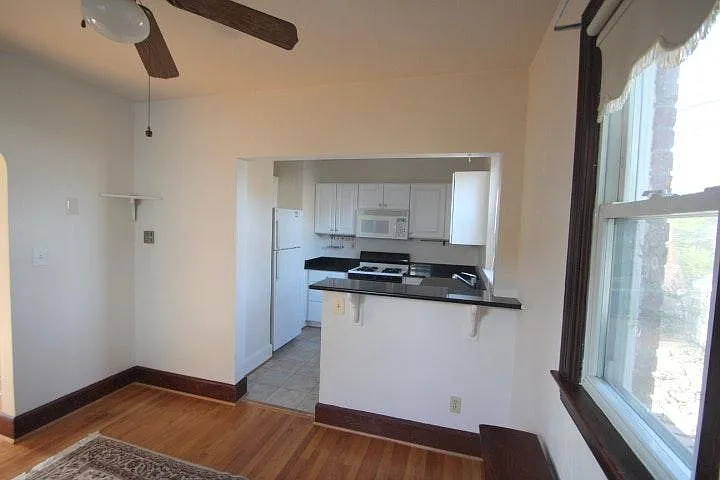 Kitchen Breakfast Bar Open to Dining Room