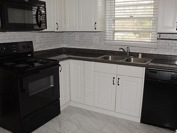 5th image of 6408 Marsh Ave NW