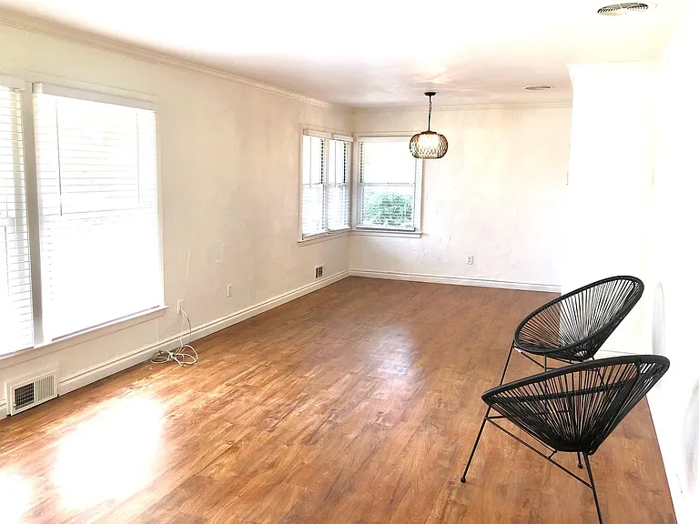 Open plan living & dining rooms. New vinyl flooring and lighting. 2" blinds throughout.