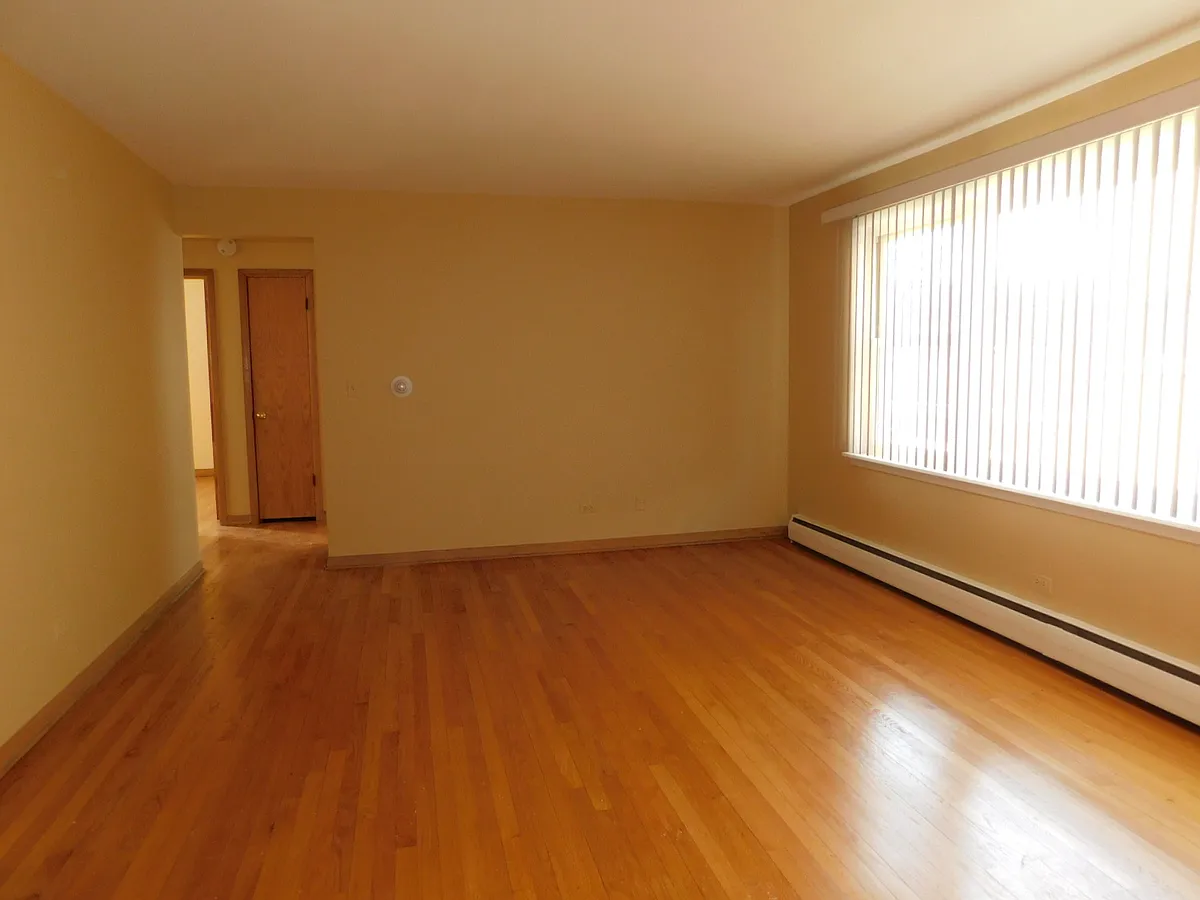 Building Photo - 6762 N Sauganash Ave #2S