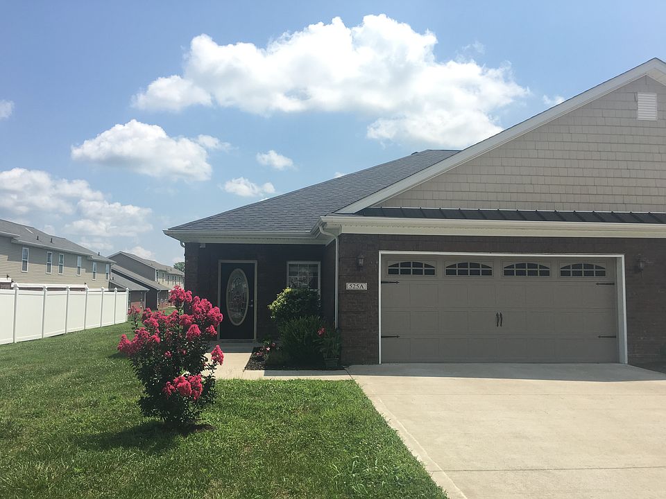 Front facade with 2 car garage and nice landscaping