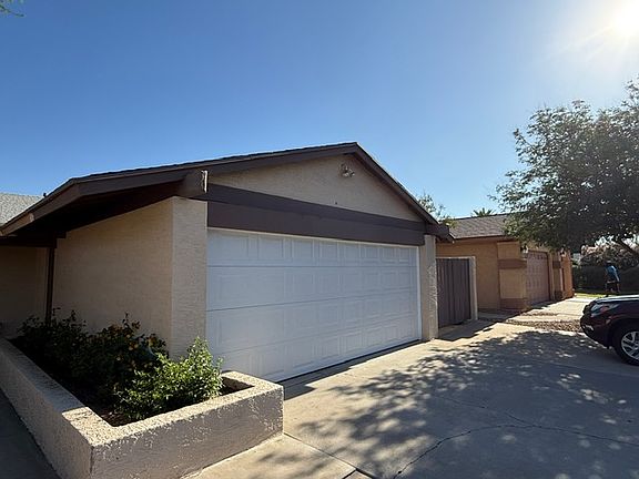 2 car garage with off street parking for 3 vehicles in driveway. Garage door with key pad. Driveway shaded in afternoon. :)