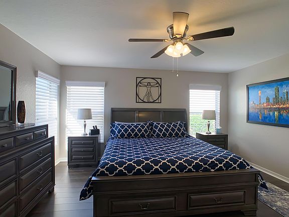 Primary bedroom, walking in from kitchen