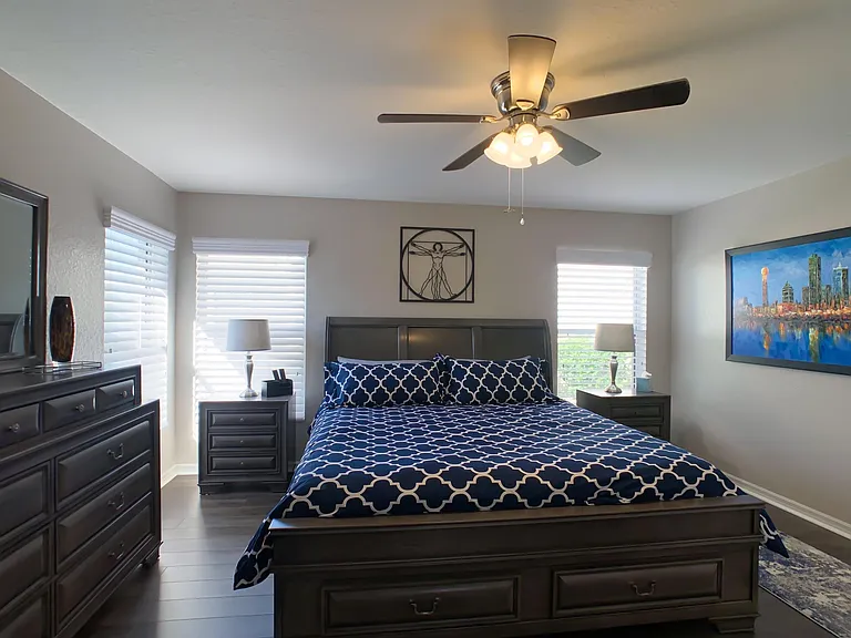 Primary bedroom, walking in from kitchen