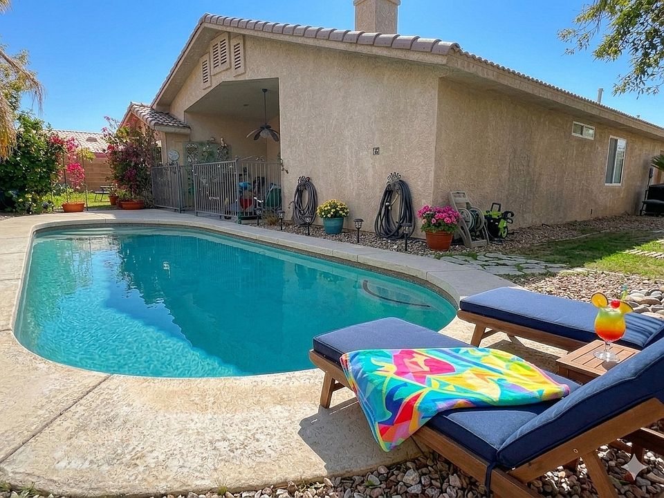 Part of the backyard with gated entrance to the salted mineral pool