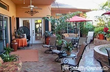 Savannah Old Brick Courtyard : Designed courtyard includes fountain with waterfall, fireplace, artis