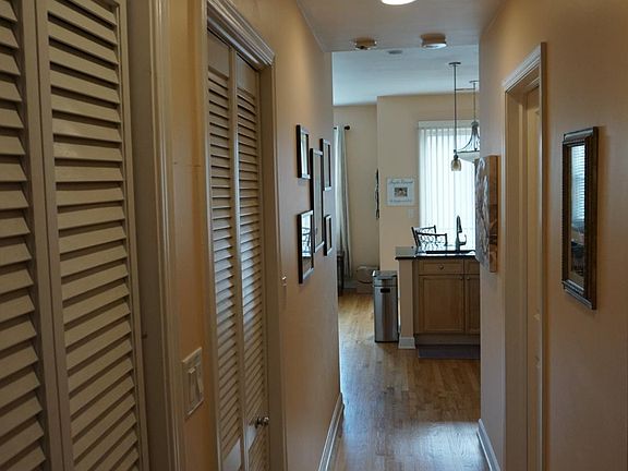 Hallway utility closet hidden (Furnance/Water Heater). Second Closet Stackable Washer/Dryer