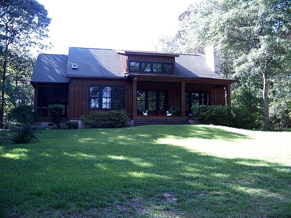 Front overlooking wooded lot