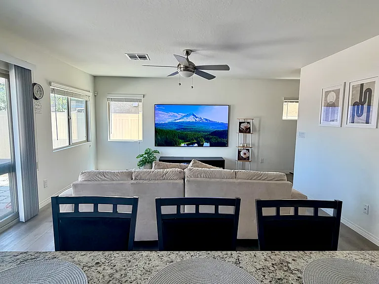 Open concept living area perfect for entertaining guests and watching tv while cooking