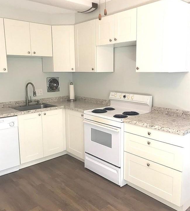 kitchen with the new cabinets and new floor