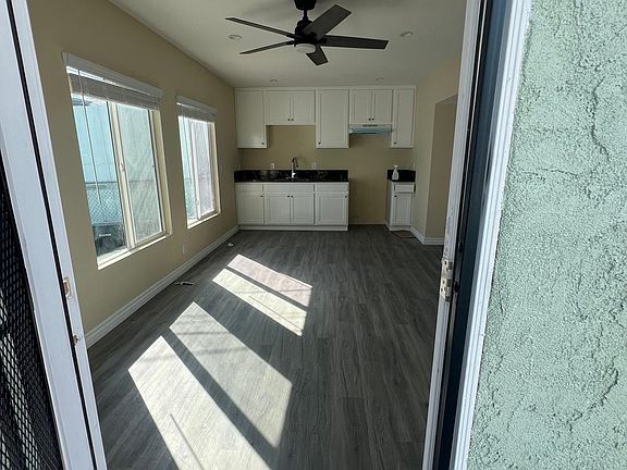 Front entrance into the living room and kitchen